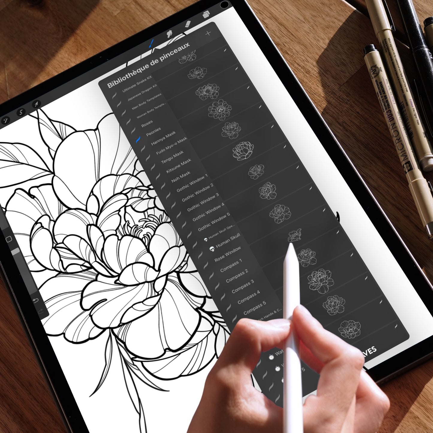 iPad screen showing a detailed floral Procreate composition using peony line art brushes, with visible brush library on the right and a pencil hand in action