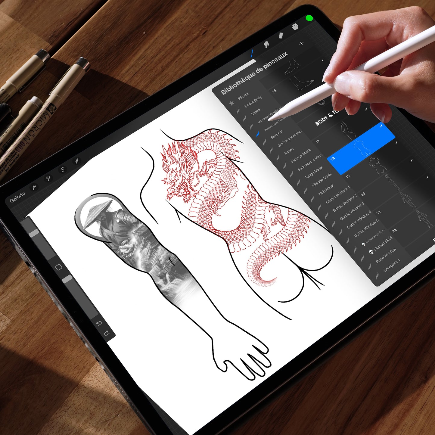 Using Procreate body template brush set on iPad – tattoo artist sketching design on female body outline