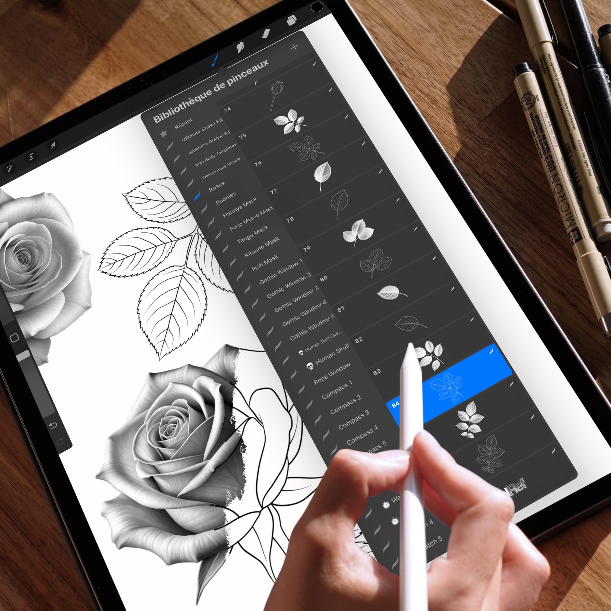 Close-up artwork of realistic roses and detailed leaves from the Realistic Roses Procreate Brush Set, featuring a mix of full render and line art.